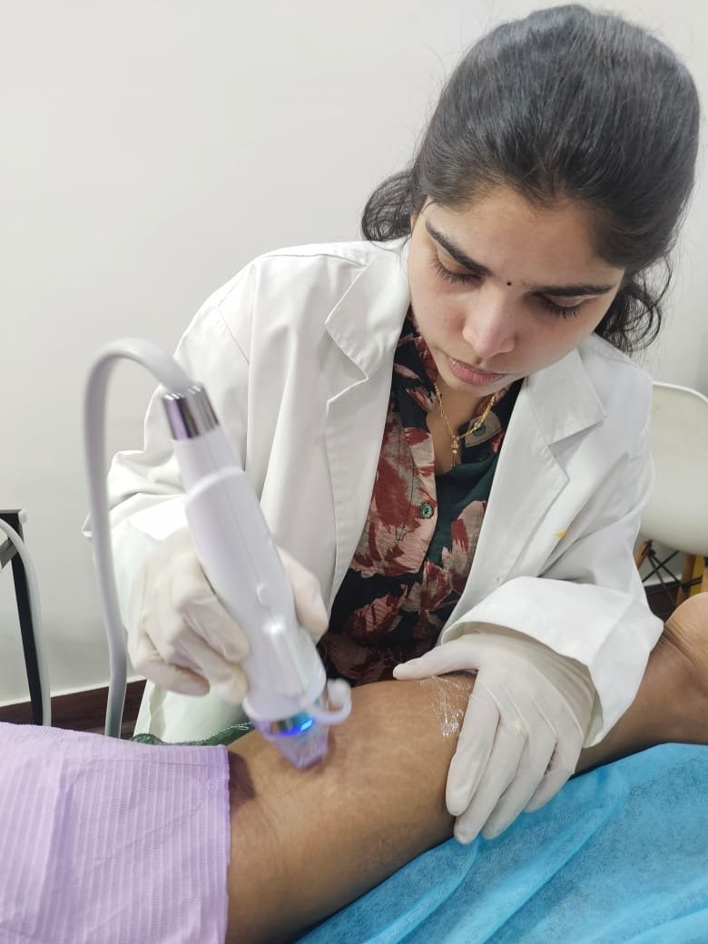 Mounika treating a patient